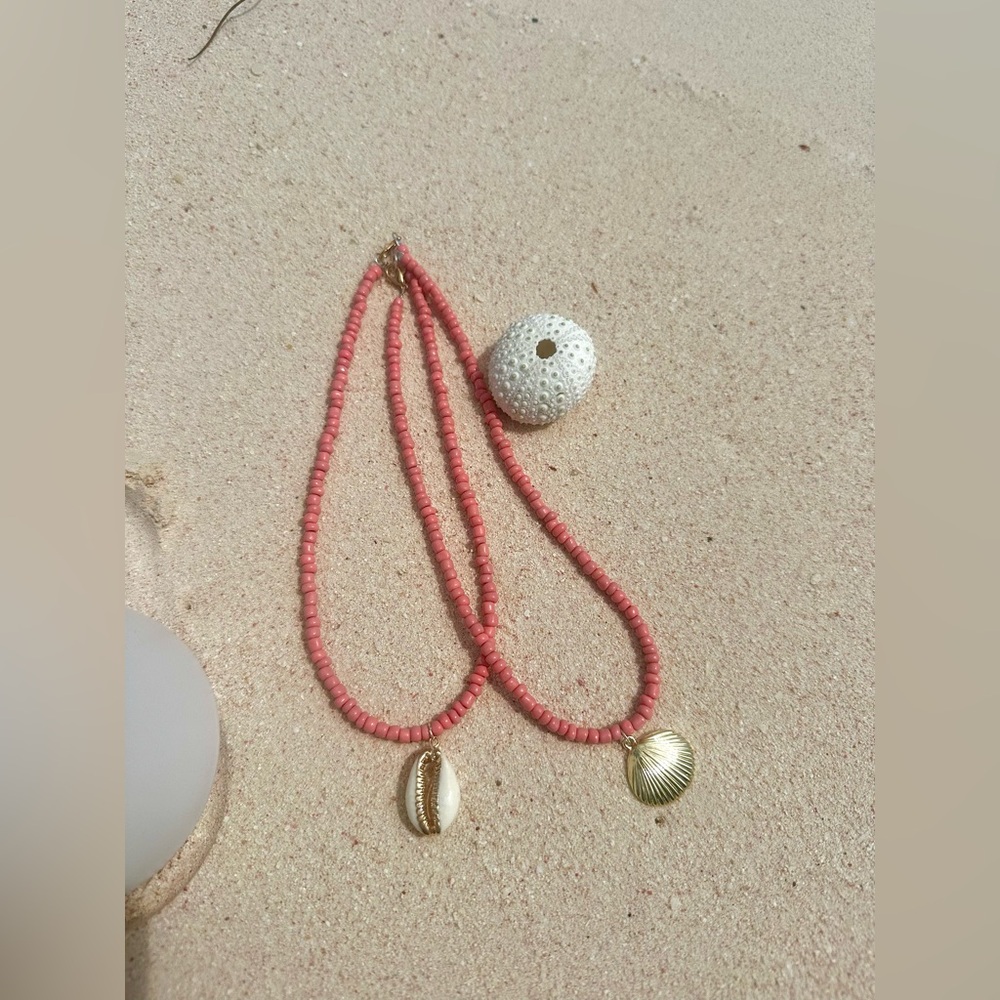 pink seed-bead necklace with golden clamshell pendant!
